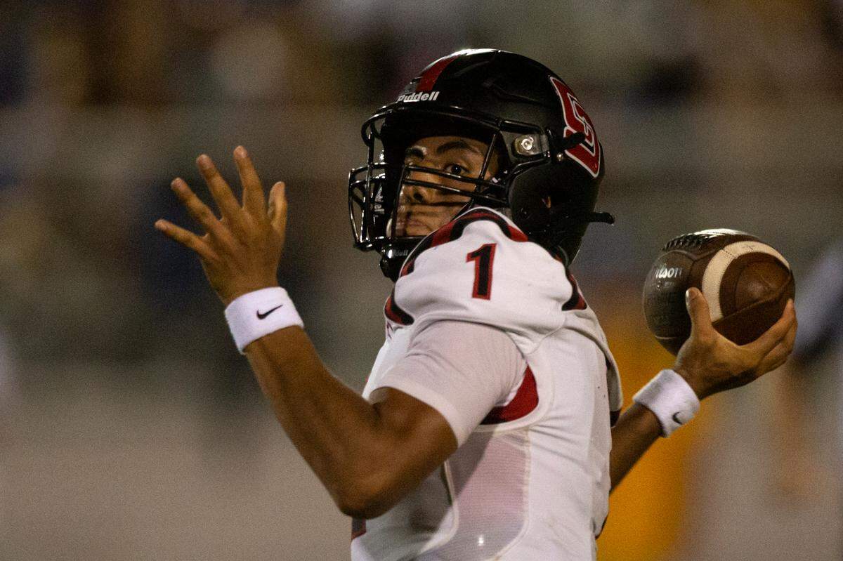 St. Stanislaus quarterback Ian Gael Gonzalez Rioz throws a pass during a game at Bay High in Bay St. Louis on Friday, Sept. 1, 2023.