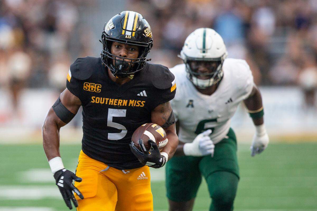 Southern Miss Golden Eagles running back Kenyon Clay (5) runs the ball during a game between Southern Miss and South Florida at M.M. Roberts Stadium in Hattiesburg on Saturday, Sept. 14, 2024.