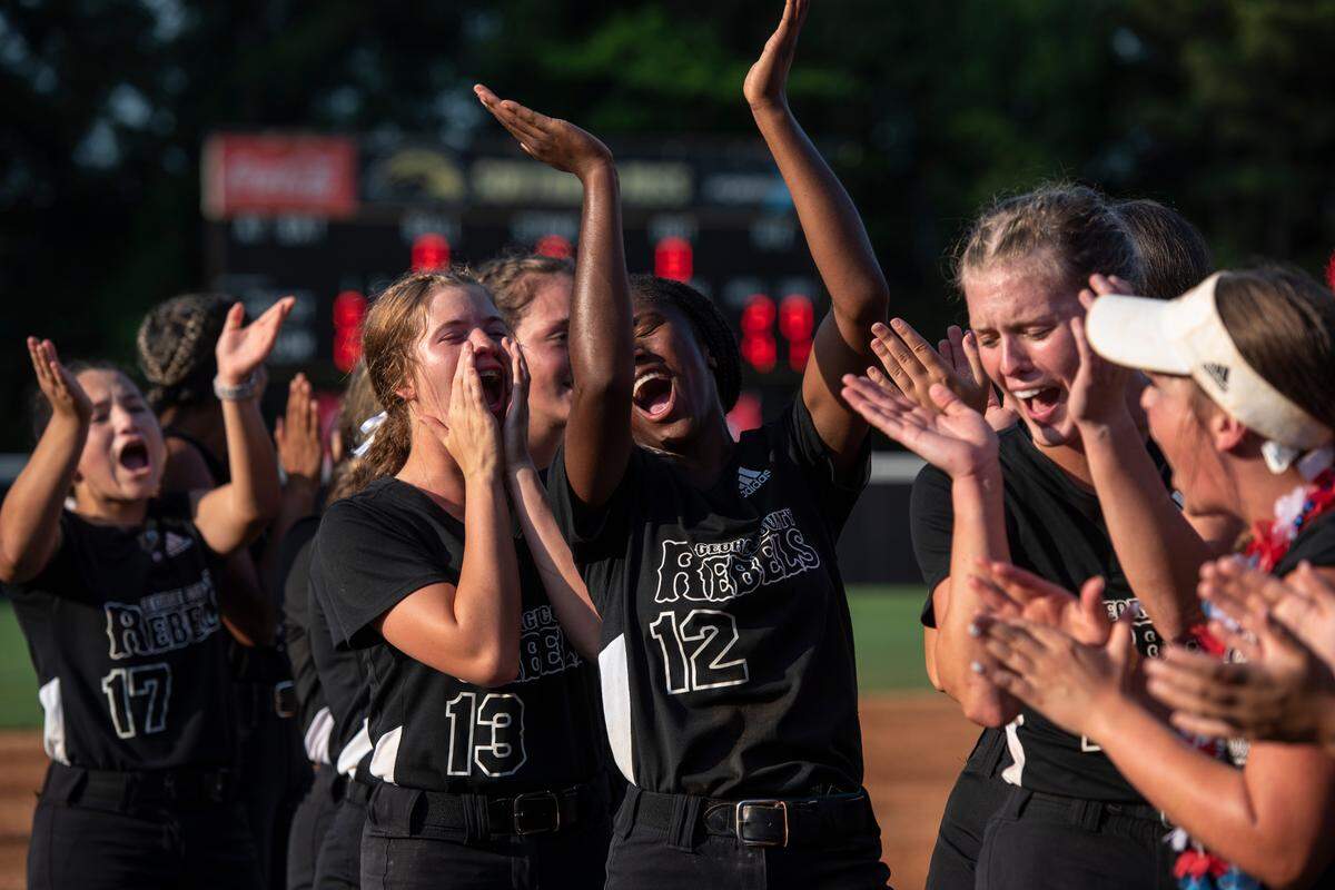 The George County Lady Rebels softball team celebrates after beating Saltillo in the 5A 2023 MHSAA Softball Championship game at USM Softball Complex in Hattiesburg on Thursday, May 18, 2023.