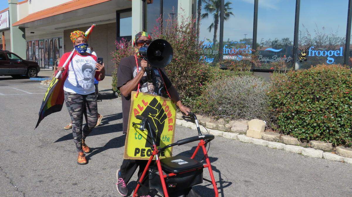 Members of Black Lives Matter Mississippi, including Anastassia Doctor, left, protested outside the Froogel’s at Hardy Court Shopping Center in Gulfport on Sunday, March 7, 2021, after a Black couple said a store employee called them the N-word.