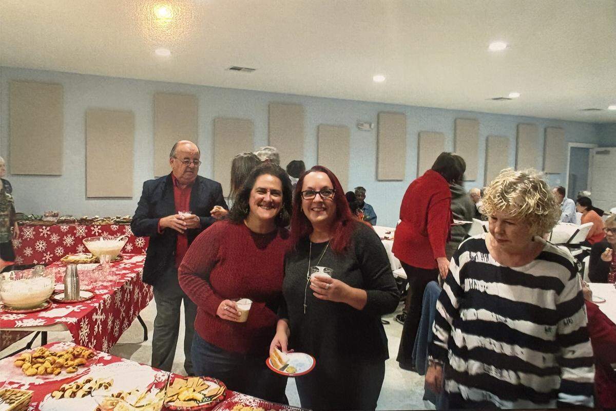 Photo albums at The Nourishing Place show Liz Thornburg, left, always smiling. Friends remembered her as generous and kind.
