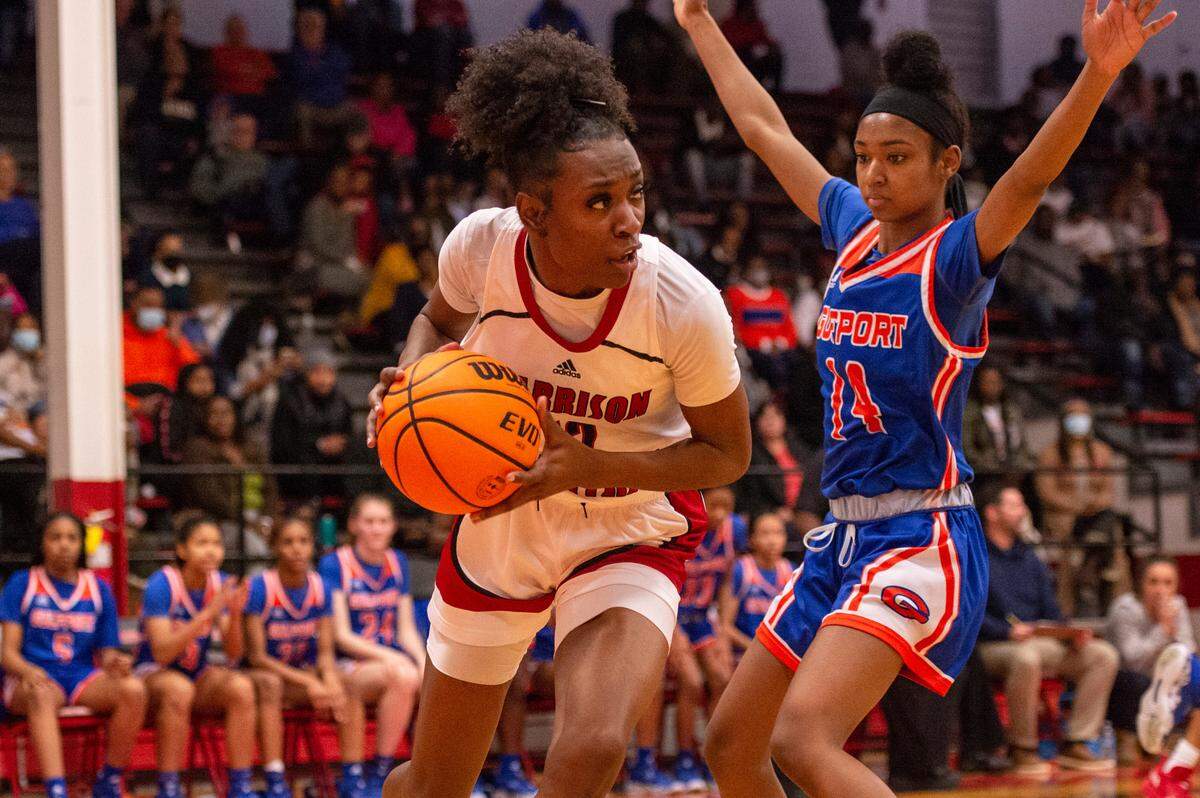Harrison Central’s Laila Walker keeps the ball away from Gulfport’s Jada Hall during a game against Gulfport at Harrison Central High School in Gulfport on Friday, Feb. 4, 2022.