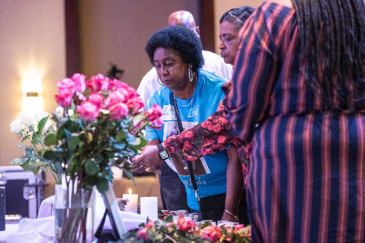 Family members of Randy Johnson light candles around a photo of him during a candlelight ceremony as a part of National Crime Victims’ Rights Week at First Baptist Church of Gulfport on Tuesday, April 23, 2024. Randy Johnson, 41, was shot and killed on Sept. 18, 2021 at the Golden Nugget Casino in Biloxi.