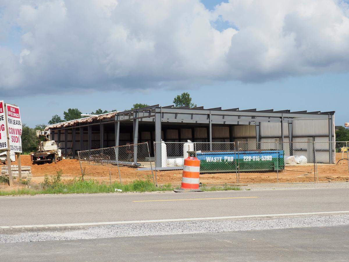 Buc-ee’s is already drawing more business to Exit 24 of I-10 in Harrison County. This is one of two new commercial buildings under construction across from the travel center.