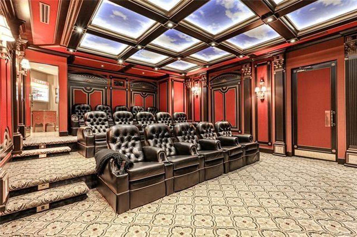The home also includes a 15-seat theater room.