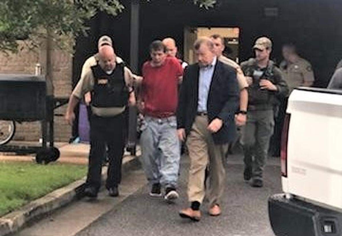 Convicted killer and prison escapee Michael “Pretty Boy Floyd” Wilson is led out of the Jackson County Sheriff’s Office substation in Ocean Springs on Saturday, July 7, 2018, after his capture in St. Martin. He was on the lam three days after his escape from a state prison in Greene County.