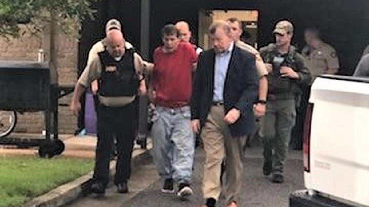 Convicted killer and prison escapee Michael “Pretty Boy Floyd” Wilson is led out of the Jackson County Sheriff’s Office substation in Ocean Springs on Saturday, July 7, 2018, after his capture in St. Martin. He was on the lam three days after his escape from a state prison in Greene County.