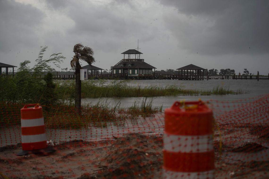 Winds pick up as water levels rise as Hurricane Ida approaches in Biloxi on Sunday.