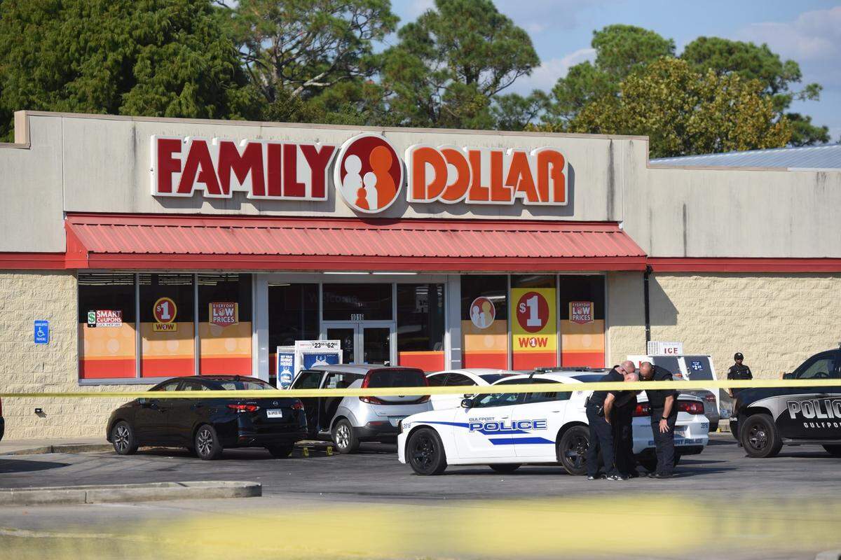 Crime scene tape surrounds the scene of an officer involved shooting at Family Dollar on Pass Road in Gulfport.