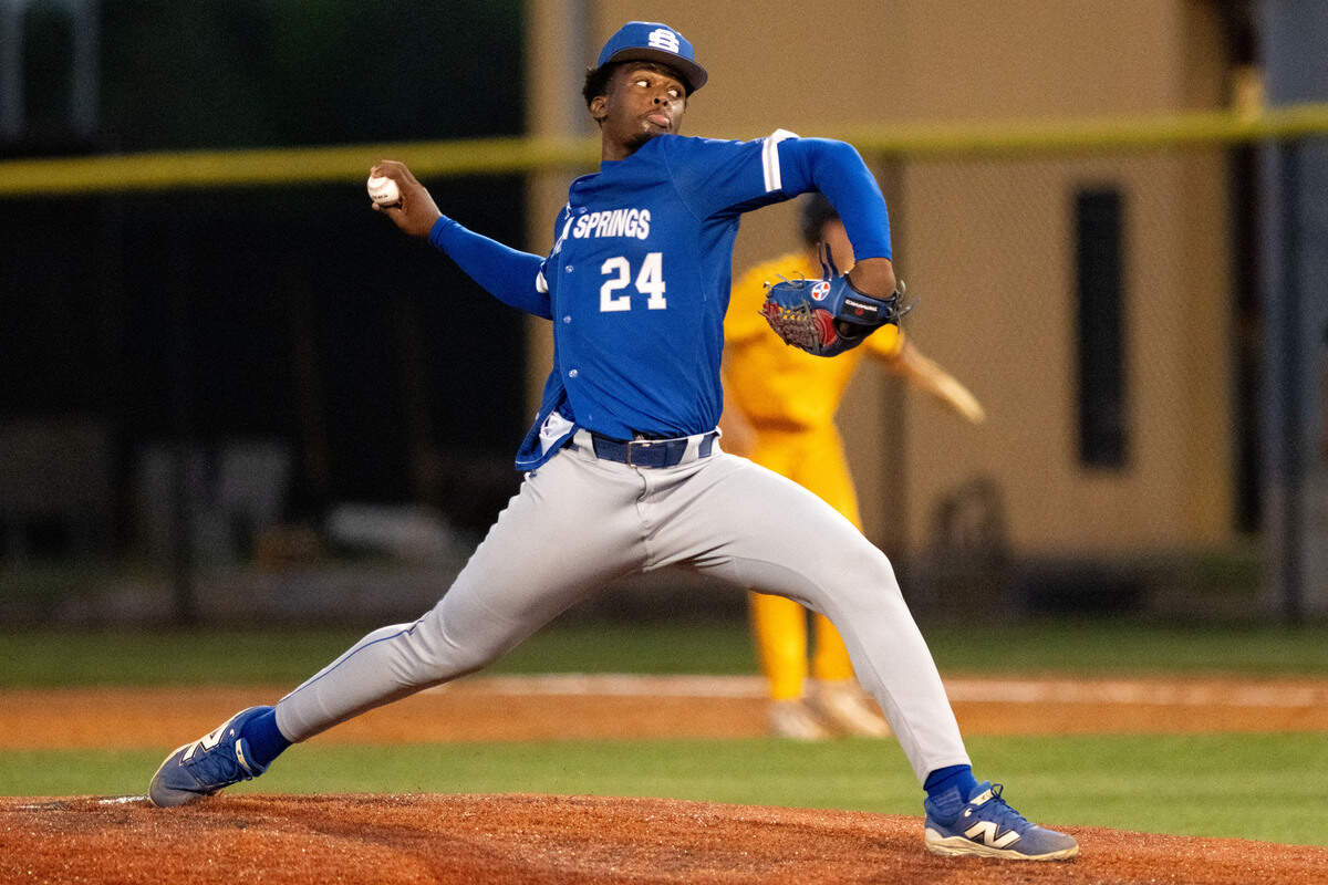 Ocean Springs’ Johan Baez (24) delivers a pitch Friday in the Greyhounds’ win over D’Iberville.