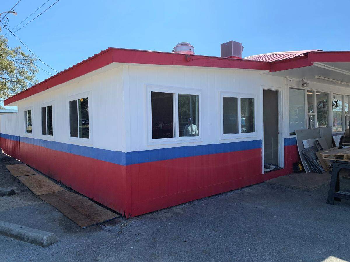 A wall of new windows was installed as PotBellies Burgers and Barbecue is prepared for a grand opening in Vancleave. The restaurant next to Vancleave High School is being remodeled and will be repainted before it opens.