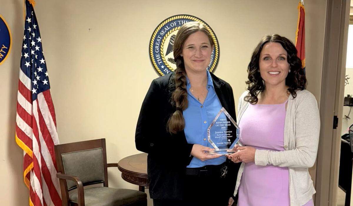 Deputy Jessica Torries and Keesler Federal’s Community Development Officer Samantha Bignell