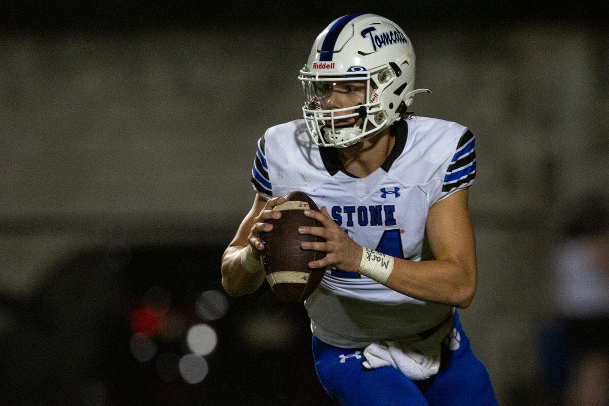 Stone’s Conner Rice looks to throw a pass during a game against St. Stanislaus at St. Stanislaus High School in Bay St. Louis on Friday, Sept. 29, 2023.