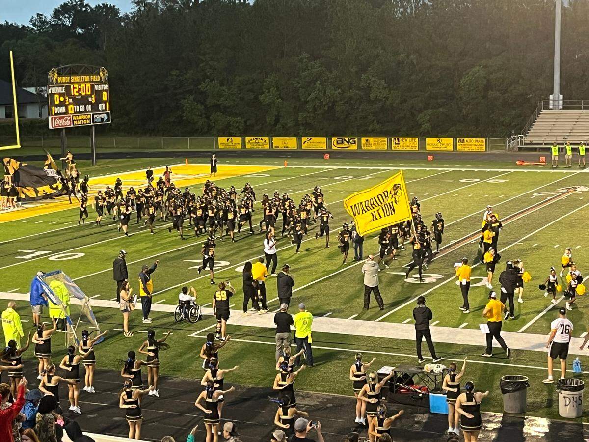 D’Iberville players take the field Friday, Sept. 6, 2024, before the Warriors’ home game against Gautier.