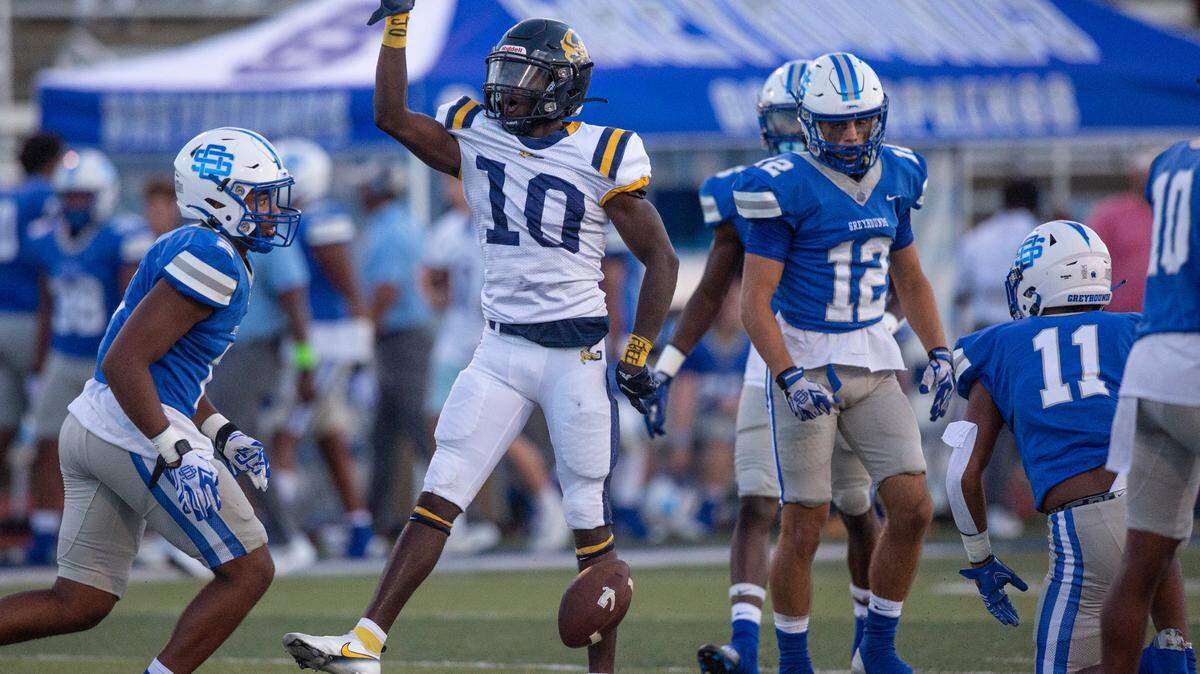 Gautier’s AJ Phillips cheers after a play during a Jamboree game at Greyhound Stadium in Ocean Spring on Friday, Aug. 19, 2022.