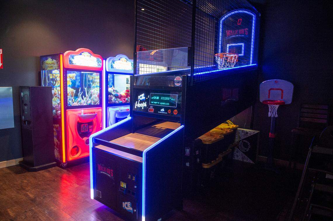 An arcade section at Walk-On’s Sports Bistreaux in D’Iberville lets customers move around and have fun while they watch the big game,