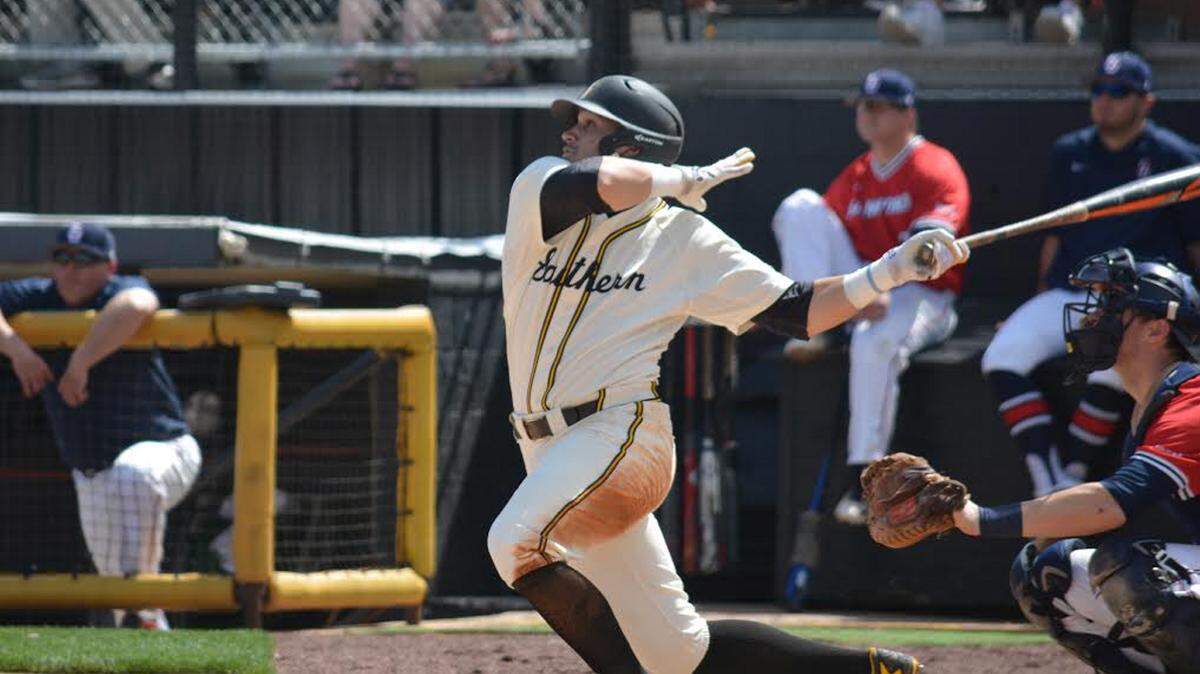 CAMAL PETRO/PINE BELT SPORTS 
 Southern Miss' Chase Scott hits a homer in Sunday's doubleheader against Samford.