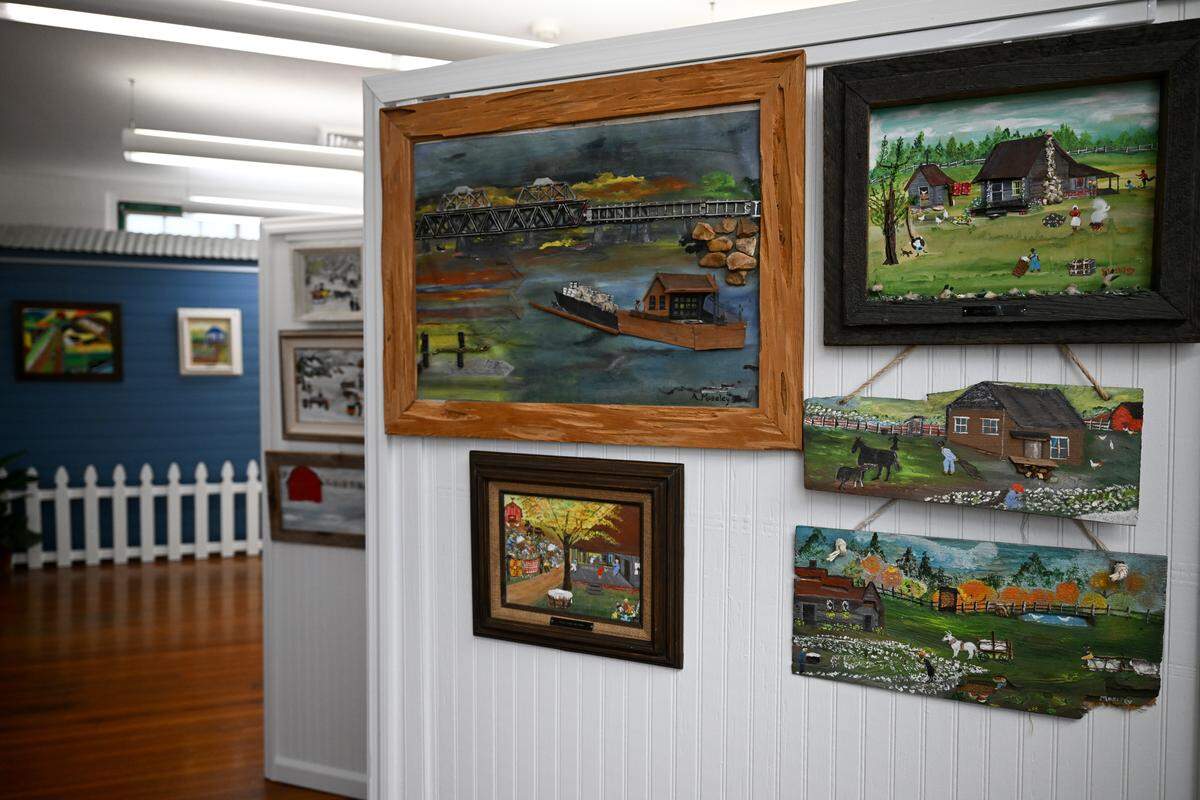 Paintings made by Alice Moseley are displayed at the Alice Moseley Folk Art Museum in Bay St. Louis on Wednesday, Aug. 27, 2025.