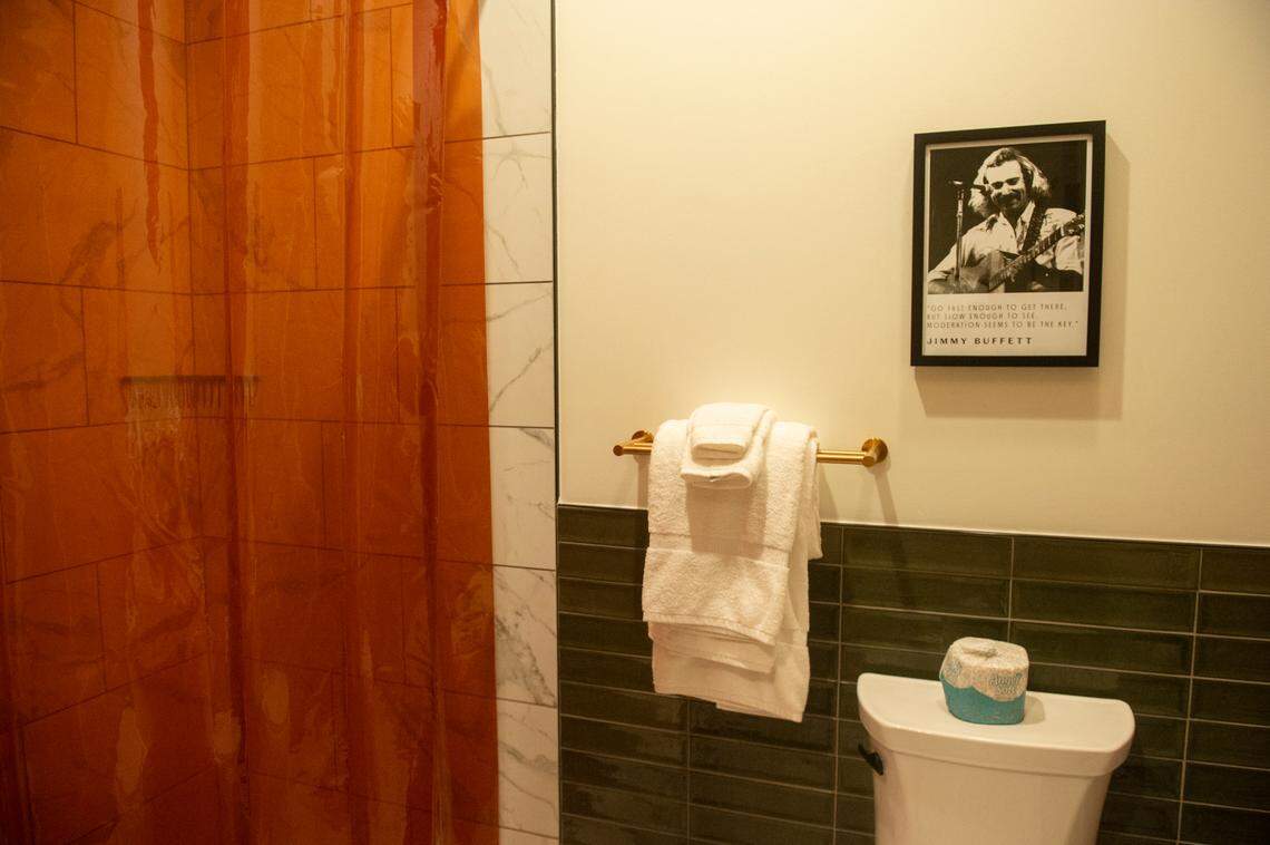 A bathroom in one of the hotel rooms at Hotel Vela in Gulfport on Thursday, Oct. 31, 2024. Each room features a photo and quote from a famous Mississippian.