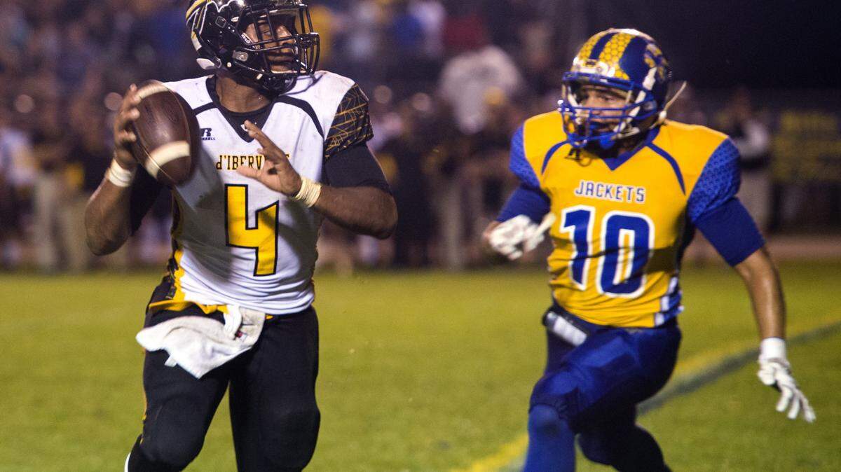 WILLIAM COLGIN/SPECIAL TO THE SUN HERALD 
 D'Iberville's Jacquelle Green (4) is among the Coast's leaders in both passing yards and rushing yards.