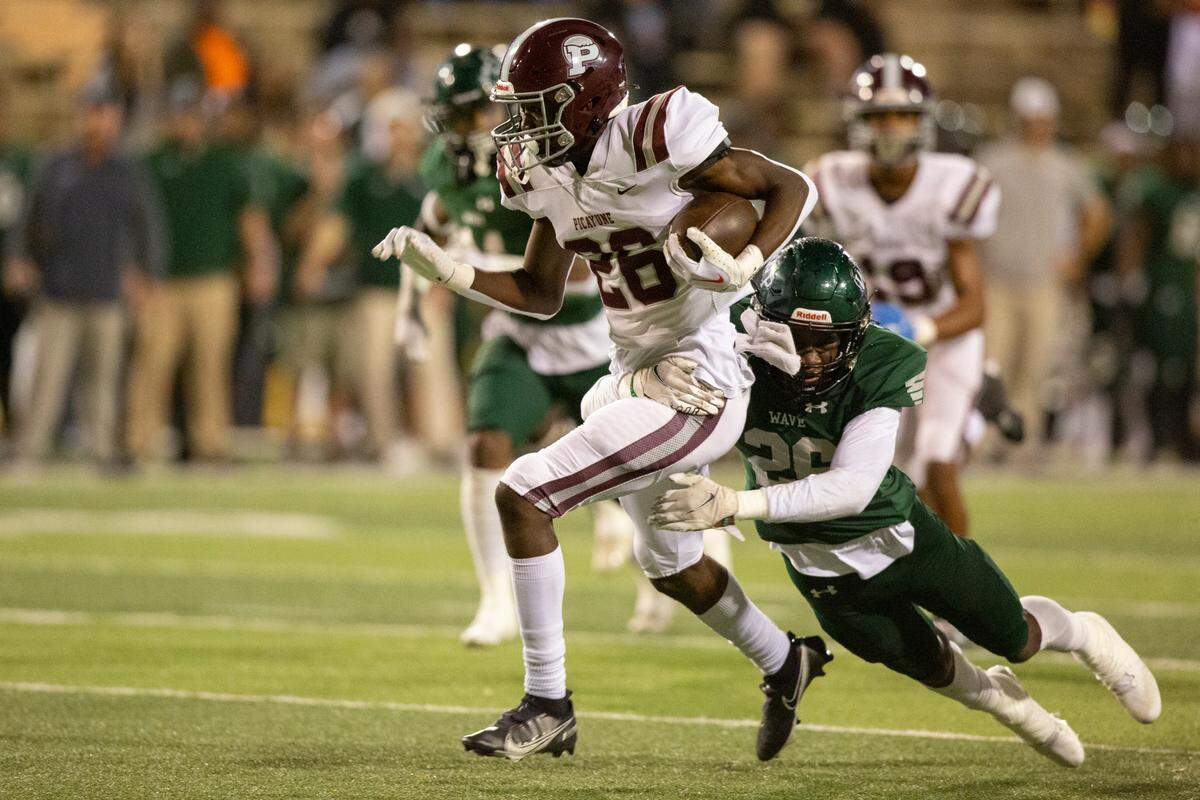 Picayune’s Tyran Warren runs the ball down the field during the 5A State Championship at M.M. Roberts Stadium in Hattiesburg on Friday, Dec. 2, 2022.