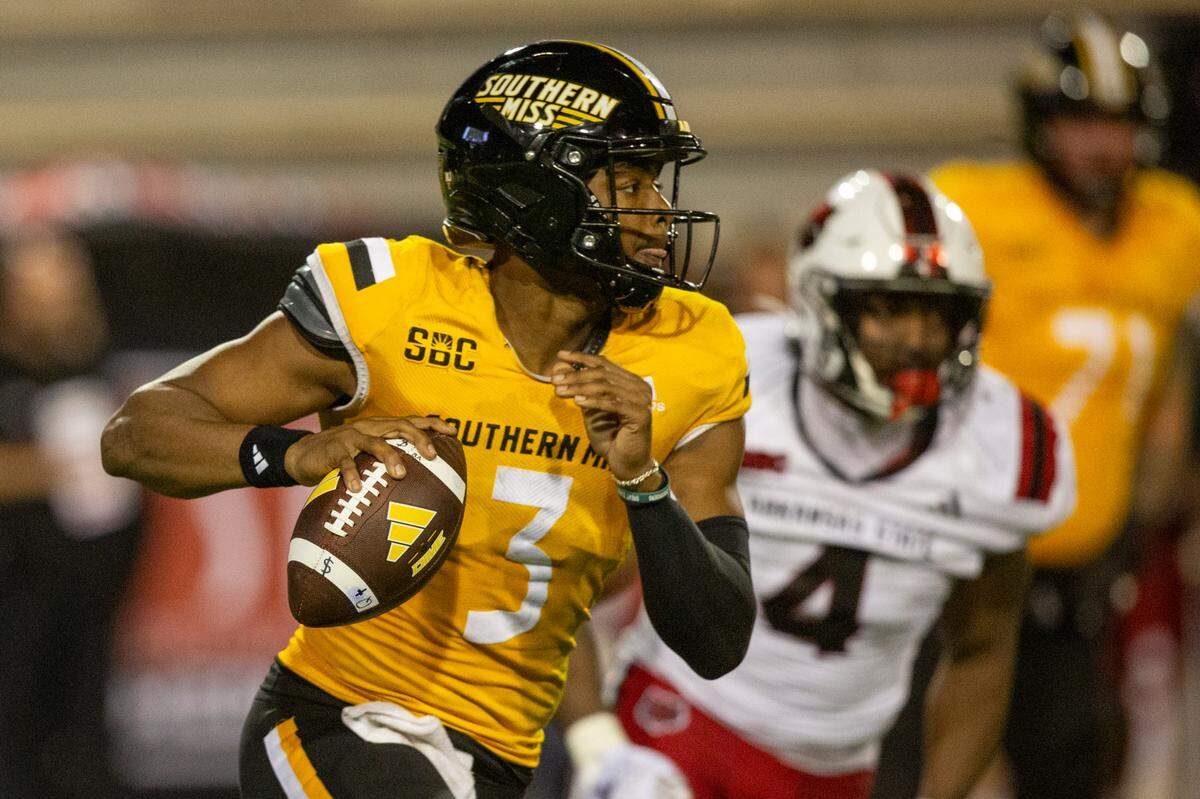 Southern Miss Golden Eagles quarterback Ethan Crawford (3) runs the ball during a game between Southern Miss and Arkansas State at M.M. Roberts Stadium in Hattiesburg on Saturday, Oct. 19, 2024.