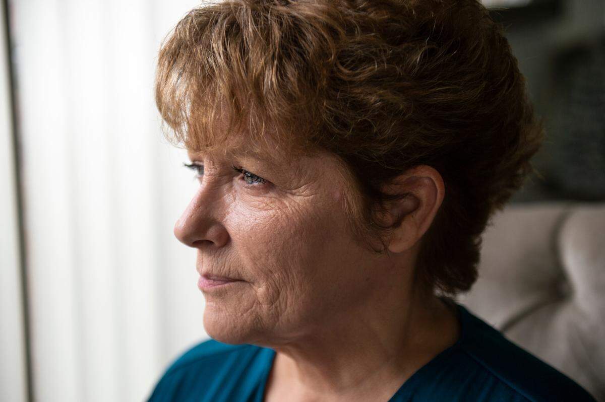 Tina Greenlee, who has been looking for a place to rent since August, looks out the window of her daughter’s house in Ocean Springs on Thursday, Dec. 9, 2021. Greenlee has had to stay with friends and family as she struggles to find an available place to rent.
