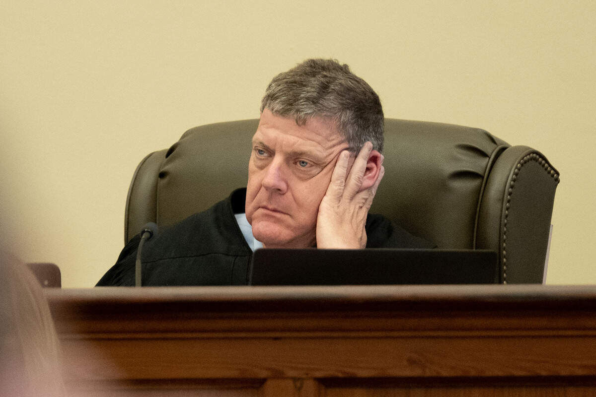 Judge Christopher Schmidt listens to a proposal for a mistrial Friday during the trial for Philip and Alan Moran.