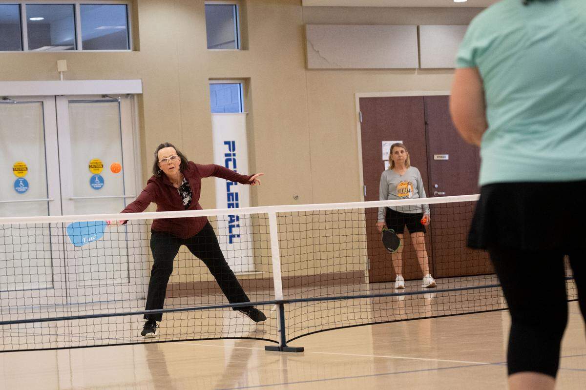 The pickleball group that plays regular games at the Lobouy Senior Center in Harrison County draws newcomers from around the country.
