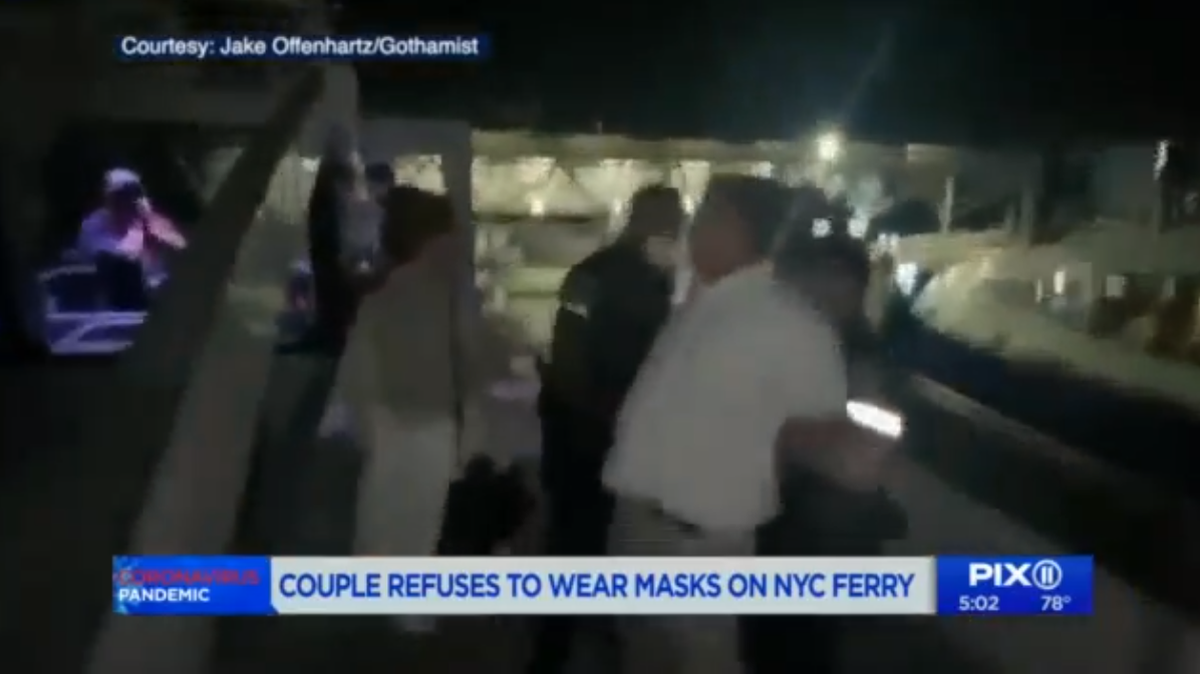 A Brooklyn couple was removed from a New York City ferry in handcuffs after refusing to wear a face mask, police said.