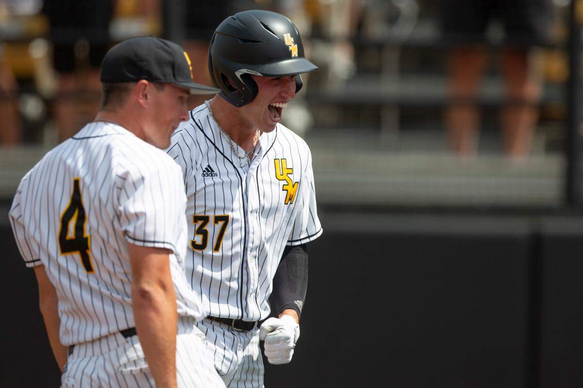 Southern Miss’s Carson Paetow cheers after scoring against LSU in the NCAA Regionals at Pete Taylor Park in Hattiesburg on Monday, June 6, 2022.