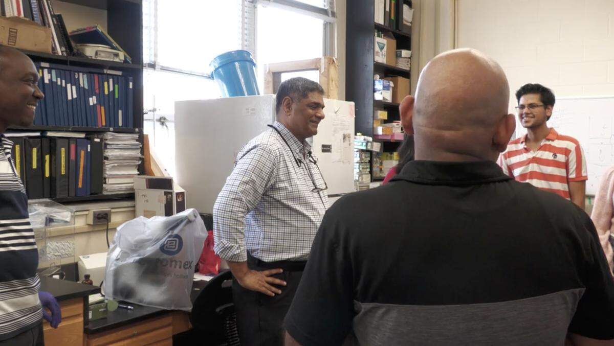Dr. Shahid Karim talks about alpha-gal syndrome in his lab at the University of Southern Mississippi with journalists and USM researchers.