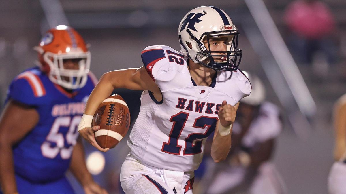 Hancock Hawks quarterback Dylan Moran (12) on the keeper during the game between Hancock and Gulfport at Milner Stadium, Gulfport, Mississippi, October 8, 2021.