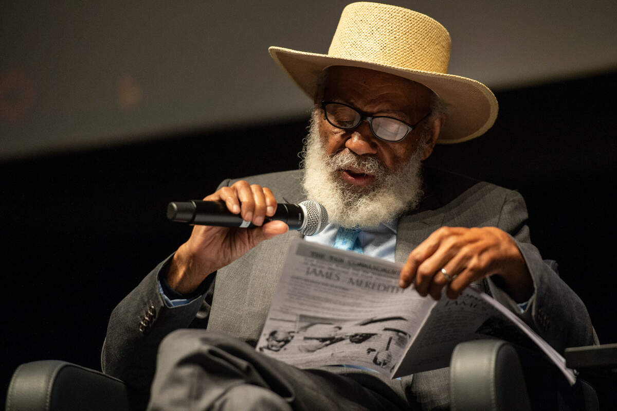 Civil Rights icon James Meredith reads from one of his books during a speech at the Immersive Media Performing Arts Center at Mississippi Gulf Coast Community College in Gulfport on Wednesday, Nov. 17, 2021.