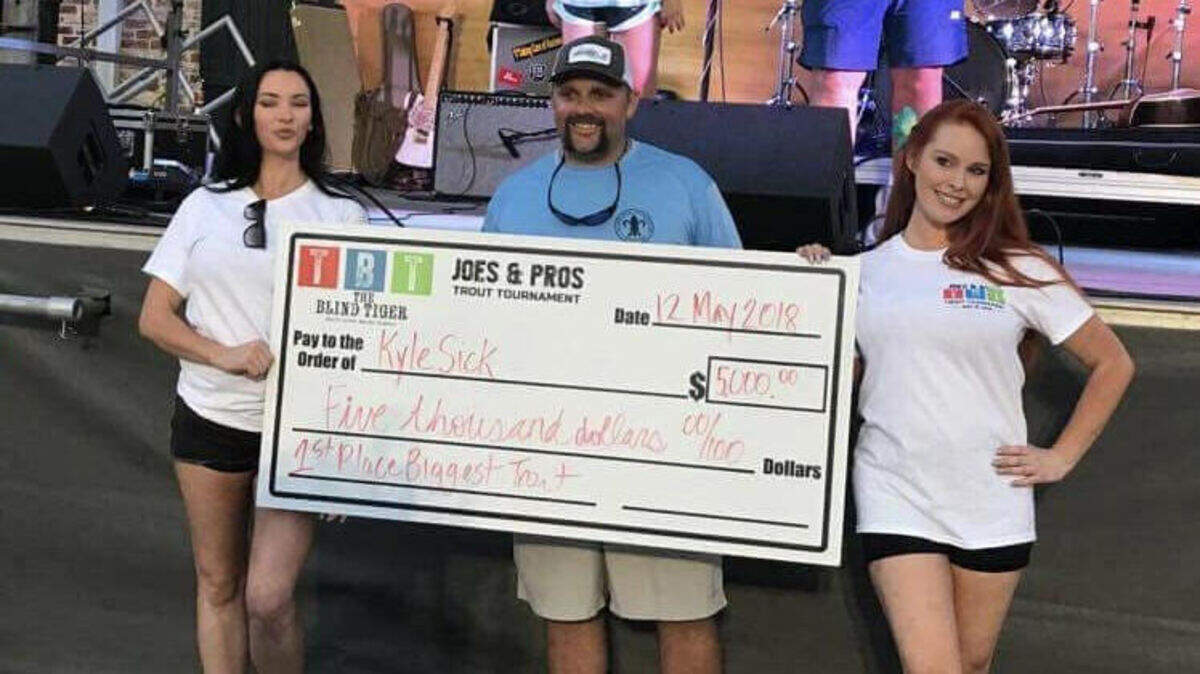 Kyle Sick of Bay St. Louis poses Saturday with his check for biggest trout at The Blind Tiger's 4th annual Joes and Pros Tournament.