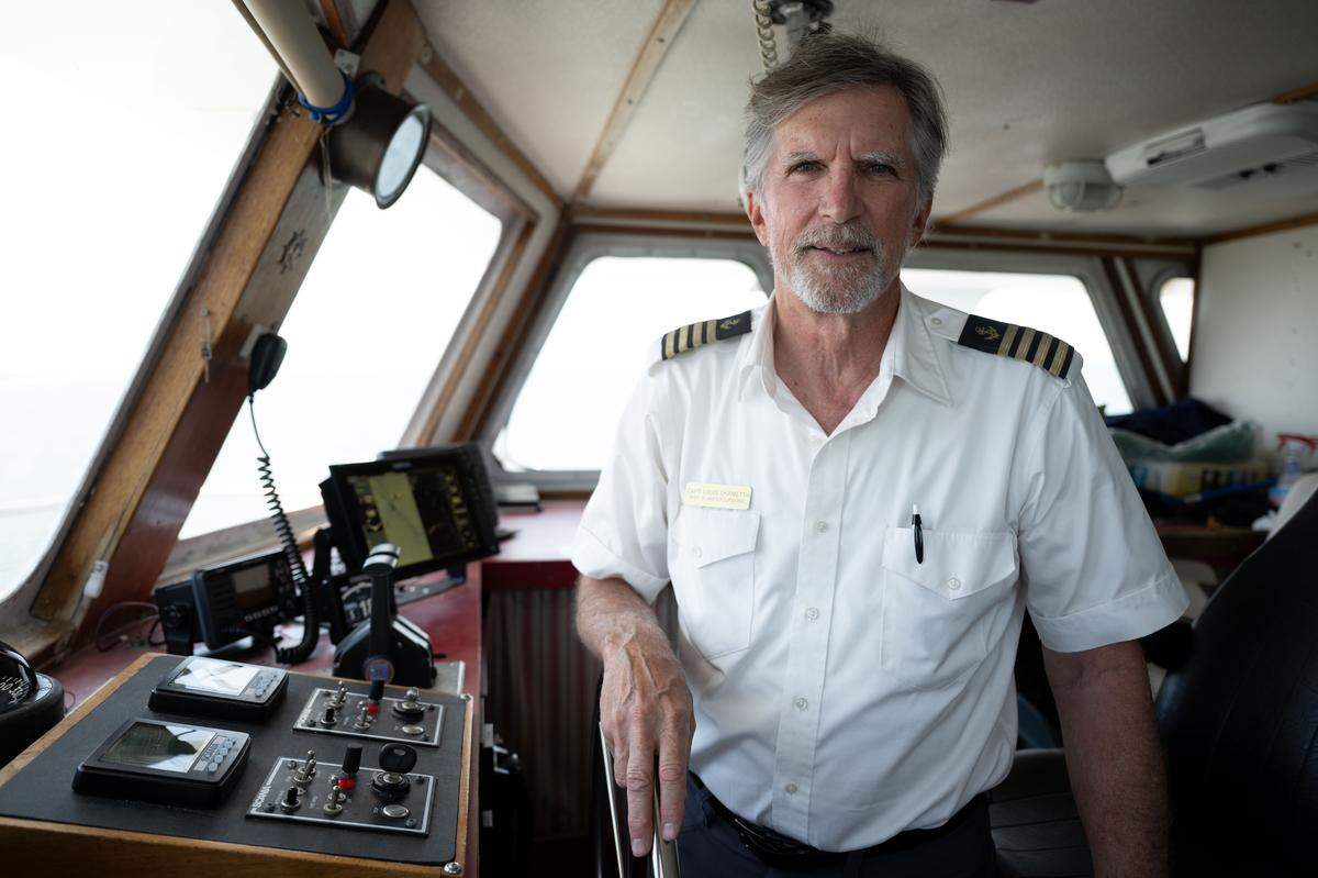 Capt. Louis Skrmetta poses for a portrait on the Capt Pete ferry during an excursion to Ship Island on Wednesday, April 29, 2026.