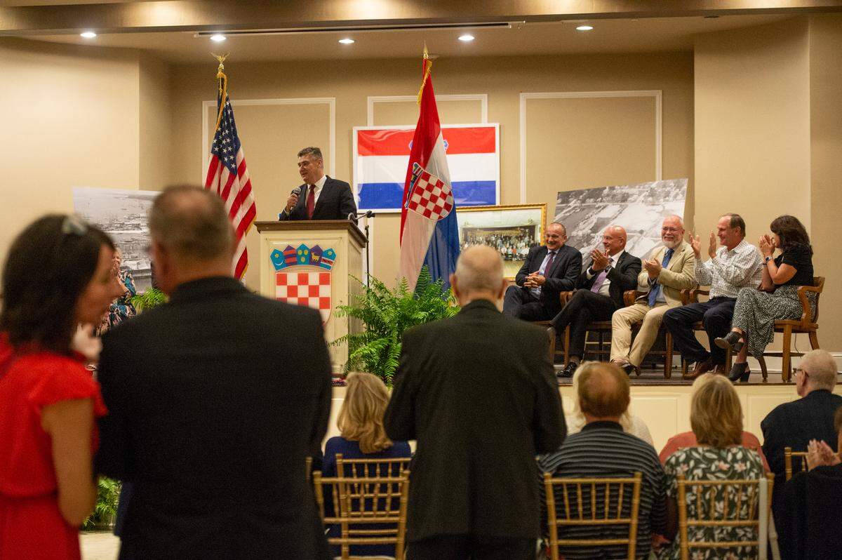 Croatian President Zoran Milanović makes a speech before members of the Croatian American Cultural Center as he is welcomed at an event at the Croatian American Cultural Center in Biloxi, Miss. on Friday, Sept. 22, 2023.