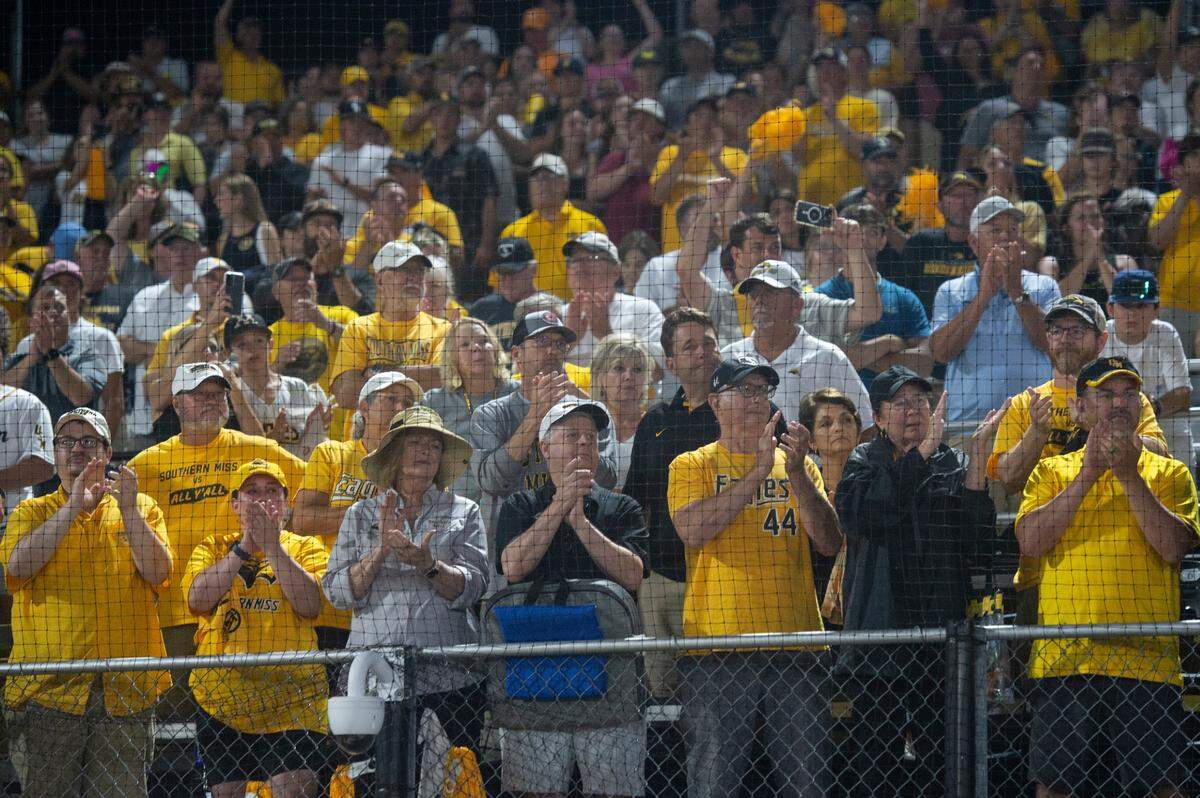 Southern Miss fans applaud their team after Southern Miss lost to Tennessee in the NCAA Super Regional at Pete Taylor Park in Hattiesburg on Monday, June 12, 2023.