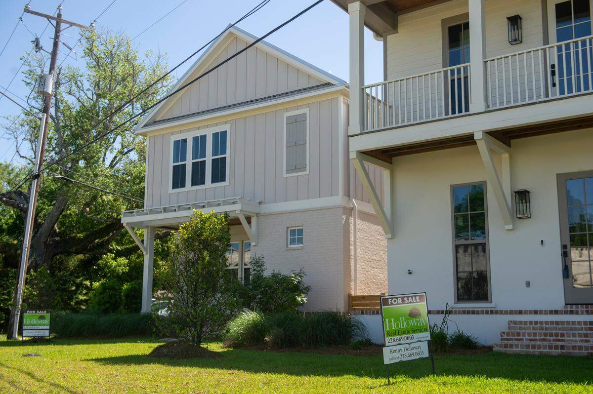 Ocean Springs Mayor Kenny Holloway is the real estate broker selling townhouses built on lots off Porter Avenue, which he bought before he took office and sold to home builder Michael Butler. While doing business with Butler, Holloway also represented the city in negotiations between Butler and residents who settled a contentious court case over his Front Beach subdivision, The Sands. Holloway said he had no financial interest in The Sands and no conflict of interest in representing the city, which he said had a minimal role in the negotiations.