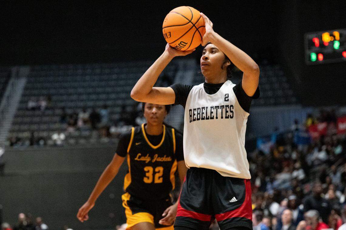 Harrison Central’s Autumn Keeler (2) puts a shot up during the Class 7A state title game.