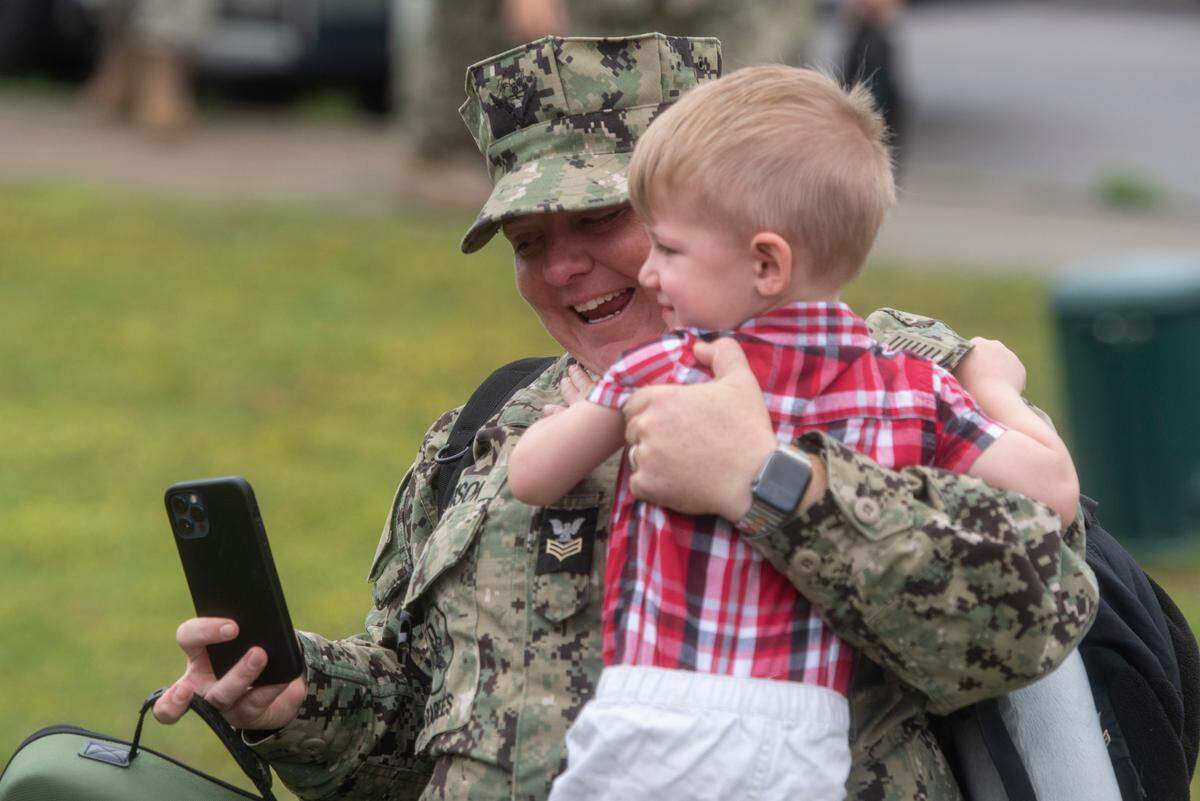 Members of Naval Mobile Construction Battalion 133 reunite with their families after returning from deployment at a homecoming event at the Naval Construction Battalion Center in Gulfport on Tuesday, March 5, 2024.