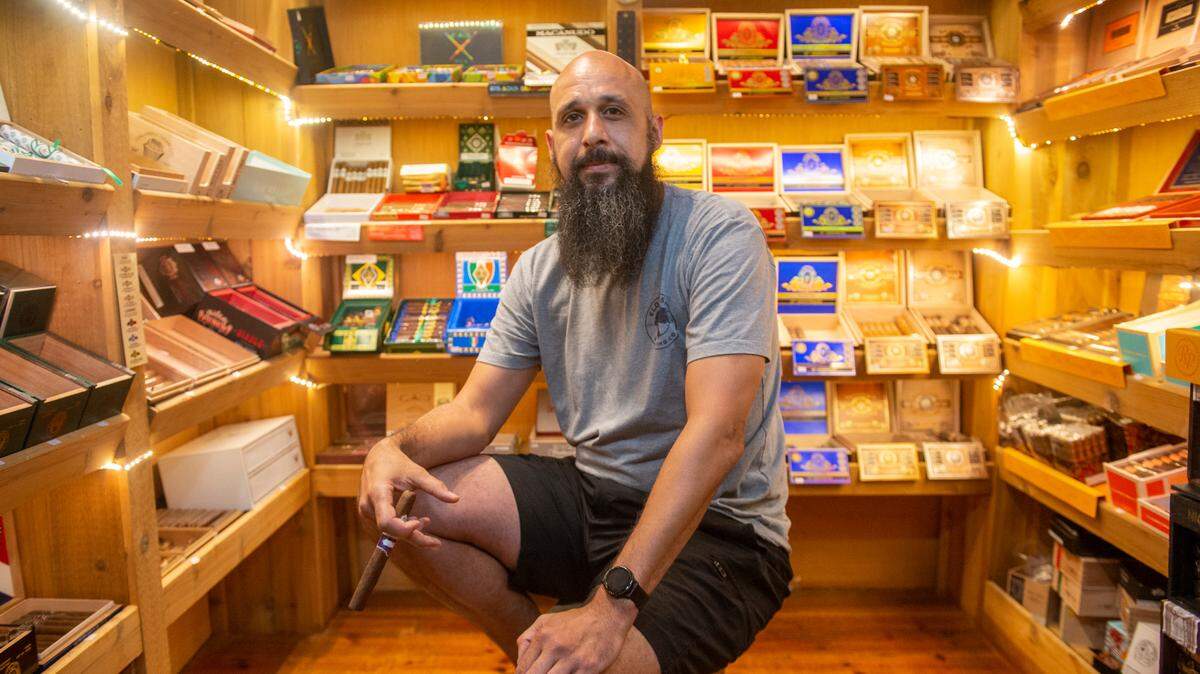 Cigars in the Pass owner Clifton Williams poses for a portrait inside a room within his business where all the cigars are stored at Cigars in the Pass in Pass Christian on Tuesday, June 27, 2023.