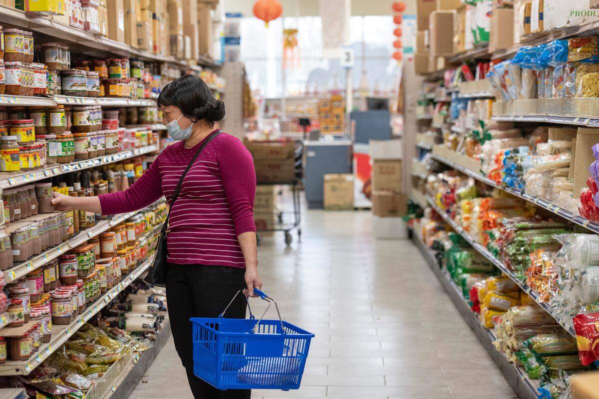 Shoppers browse the shelves at Lee’s International Market in Biloxi on Monday, Jan. 24, 2022.