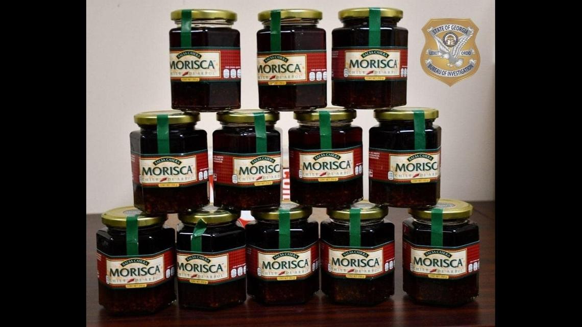 Two people from South Georgia accused of trafficking liquid meth hidden in 120 jars of “salsa” have been arrested and charged, according to the Georgia Bureau of Investigation.