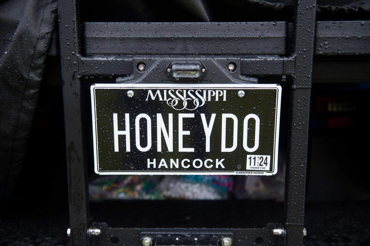 A license plate that reads “HONEYDO” on the back of the golf cart of Daniel “Danny” Chauvin, also known as the “Honey Do Dude” on Thursday, Jan. 25, 2024. Chauvin rode the golf cart in a Christmas Parade he was asked to be in.