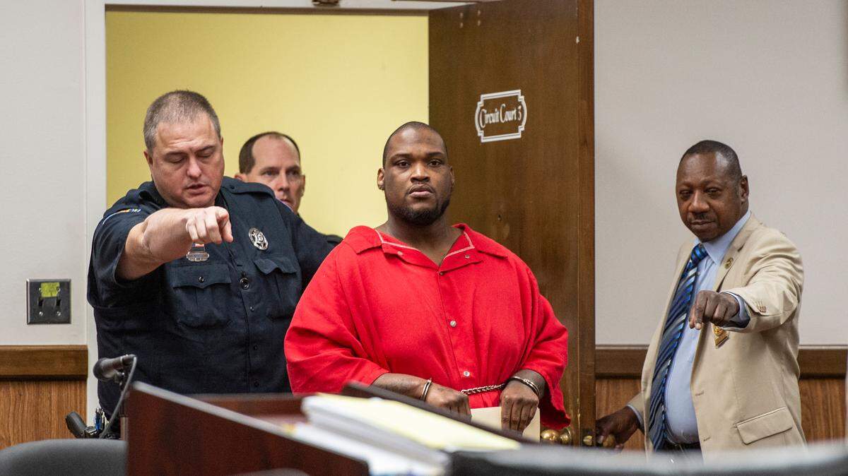 Andrew Malik Jones arrives at the Harrison County Courthouse in Gulfport on Wednesday to plead guilty to three charges.