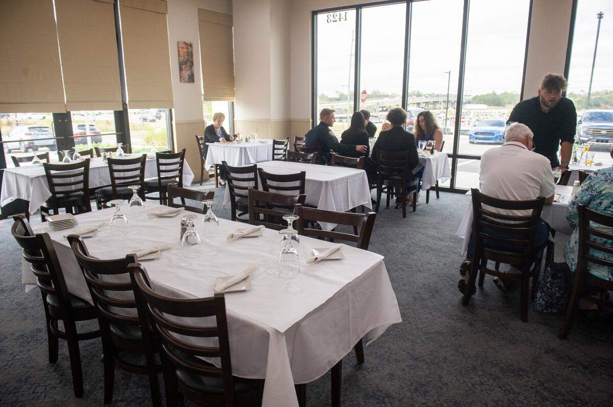 People enjoy dining out at Mangiamo Italian restaurant in Gulfport. Revenue at Coast restaurants, shops and casino remains strong during inflation.