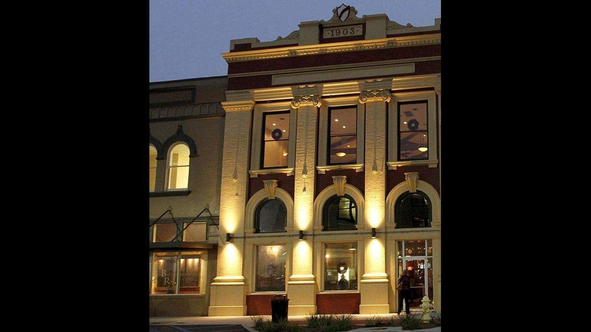Present: This historic building in downtown Gulfport became home to The Rack House Steak & Spirits in 2017.