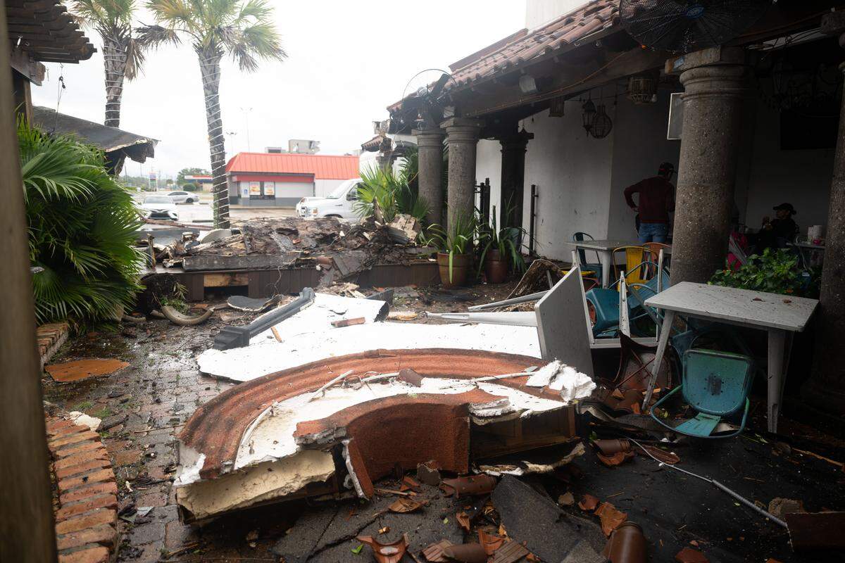 Interior damage at Aztecas Restaurant & Cantina after a tornado in Gautier.
