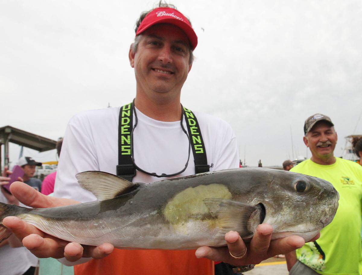 Todd Rosetti of Ocean Springs holds the 6.4-pound smooth puffer he brought in at Gorenflo’s Cobia Tournament at Point Cadet Marina in 2016. Rosetti, sales manager at Quality Poultry & Seafood in Biloxi, now faces federal charges of misbranding seafood.